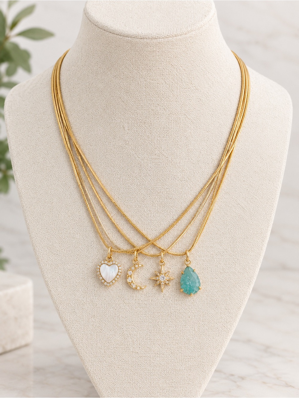 Luna Norte Gold Layered Pendant Necklace with Heart, Moon, Star & Teardrop